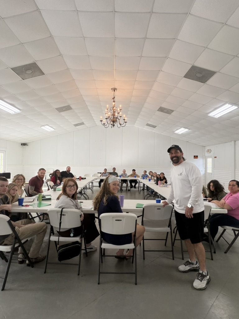 Chad teaching around the table